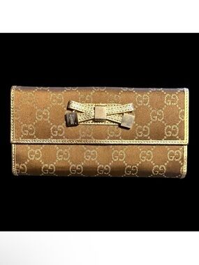 Gucci Princy Long Trifold Flap Wallet Gold Metallic and Brown GG Monogram Bow